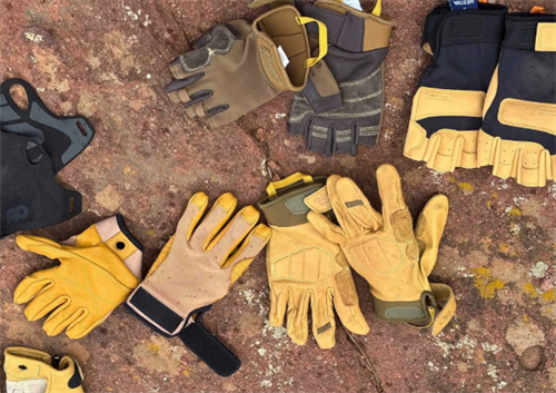 Variety of climbing and trekking gloves, including fingerless and full-fingered models, ideal for pre-dawn starts and alpine climbing