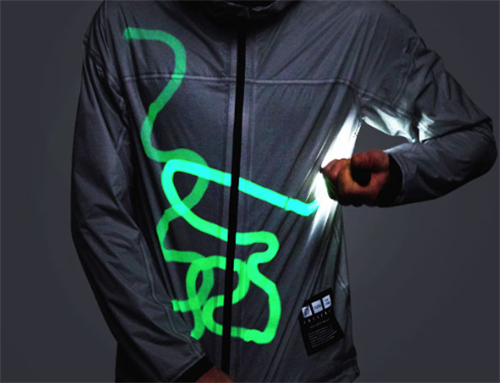Glow-in-the-dark trail map drawn on a self-heating jacket, demonstrating smart textile technology for night navigation