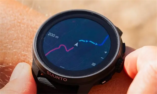 Close-up of a Suunto smartwatch displaying a trail map and route, demonstrating its function as a wearable navigation coach